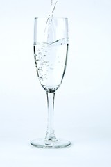 pouring water in glass