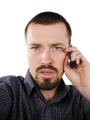 worried young man calling mobile