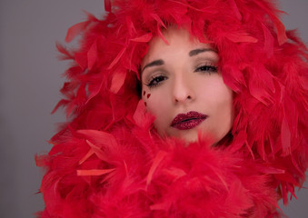 Fototapeta premium beautiful face with red boa