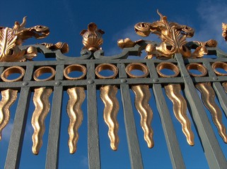 a piece of a golden palace gate