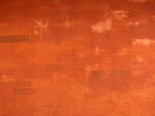 Fotobehang orange brick wall © laurent dambies