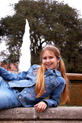 pretty girl by fountain