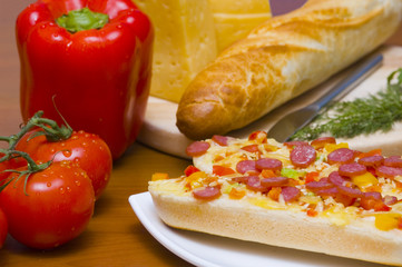 baguettes with pepperoni on the plate
