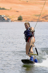 girl wakeboarding at lake powell