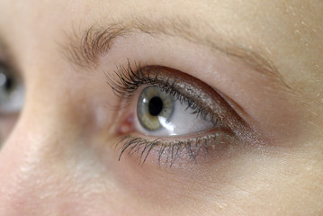 one woman eye close up