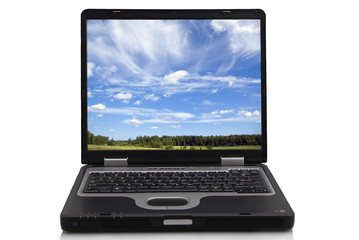black opened notebook with landscape background