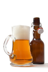 full beer mug and bottle