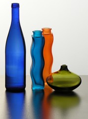 multi-color glass bottles and wase