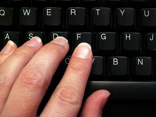 typing on a keyboard