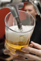 mug is filled with beer.