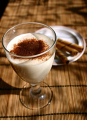 mousse desert with chocolate dusting still life