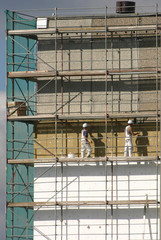 workers on a scaffold
