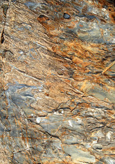 multi-colored rock surface background.