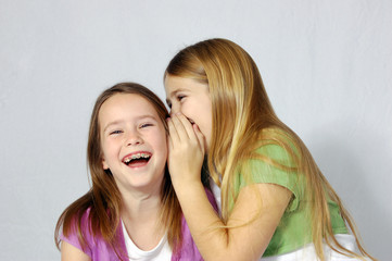 girls sharing a joke