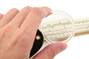 folding magnifier and slide rule