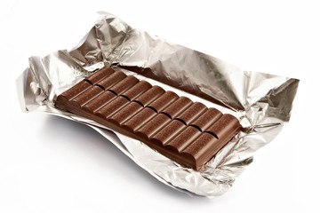 chocolate bar in the opened packing isolated