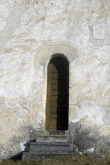 door on stone wall