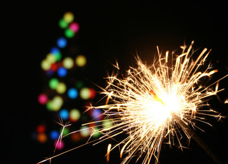 sparkler and christmas tree