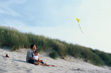 couple enfant plage