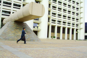 businessman walking in a business center #2