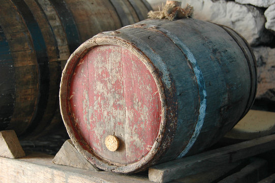 old wine barrel in a traditional adega in azores, portugal