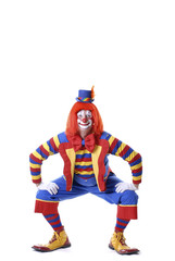 squatting circus clown