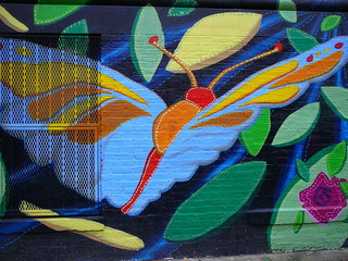 colorful community mural of butterfly - obrazy, fototapety, plakaty
