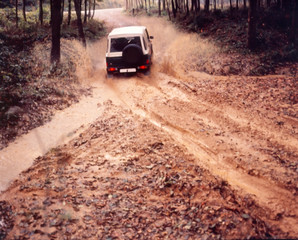 Obraz na płótnie Canvas truck on the muddy dirt road
