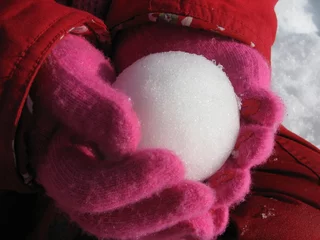 Fotobehang snowball in hands © Vladislav Gajic