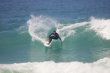 surfer executing a cutback maneuver