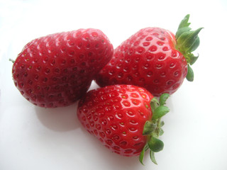 three fresh strawberries