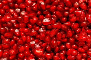 pomegranate seeds arranged as a background