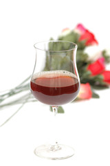 wine glass and flowers isolated on white