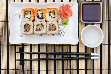 sushi (rolls) on a plate