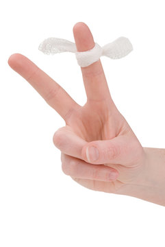 peace sign with a bandage