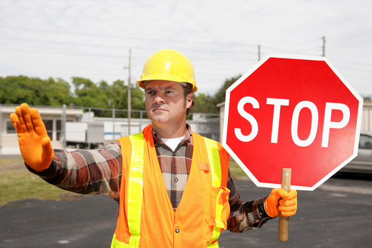 construction crew stop sign