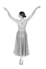 ballet dancer on points rear view