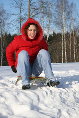 Fototapeta na wymiar girl on sled