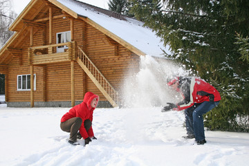 couple winter house throw snow