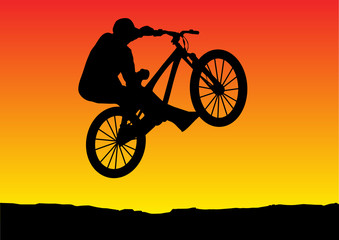 Fototapeta na wymiar sunset bicycle jumping