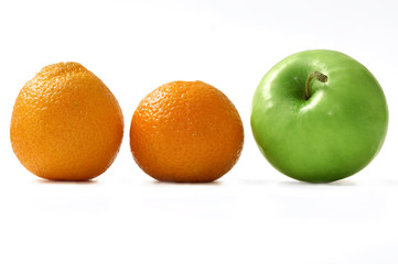 oranges and green apple