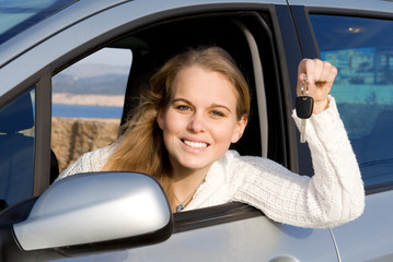 woman with new car and key