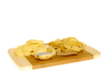 preparing dinner, peeling potatoes