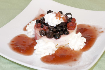 dessert with fresh fruit and whipped cream.