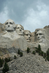 mount rushmore under stormy skies