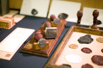 ornate graven iron signet and some sealing-wax