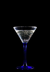 glass of champagne on black