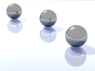 three metal spheres