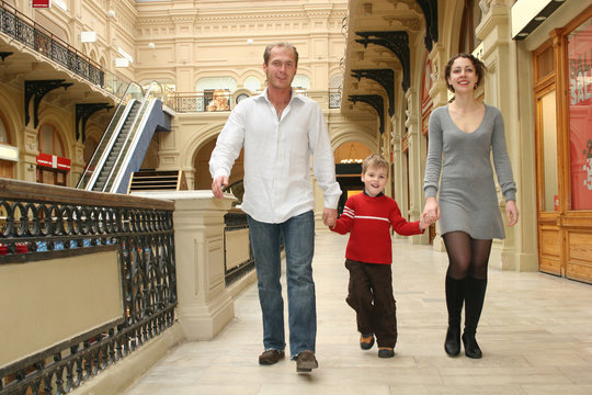 Family Walking In Shop