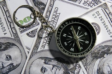 compass over money